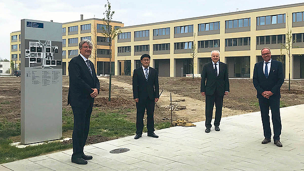 Professor Lachmayer, Herr Li (Promovend), Professor Scharf, Professor Behrens